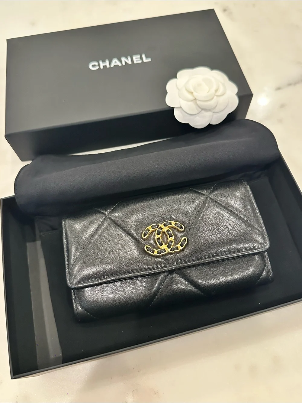 CHANEL Black Quilted Leather Wallet with Gold CC Chain Logo
